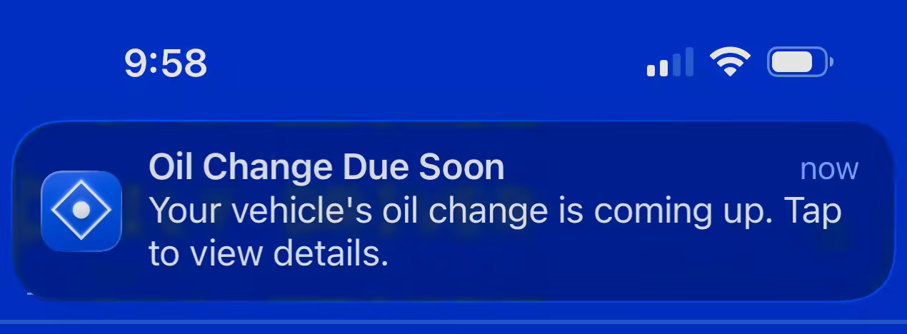 Checkpoint app notification banners showing vehicle maintenance reminders with escalating urgency